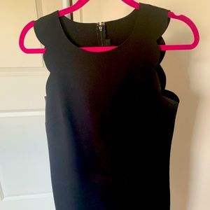 Jcrew scalloped black dress. Size 4. Fits loosely. Decently worn.